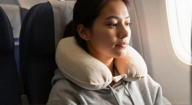 whats the proper way to wear a travel pillow